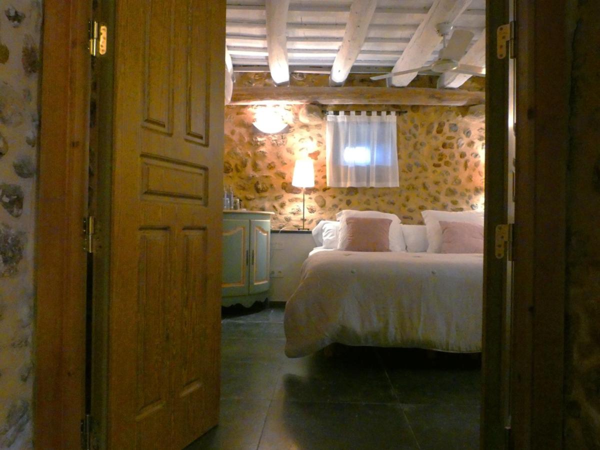 Cama o camas de una habitación en Casa Anamaria Hotel