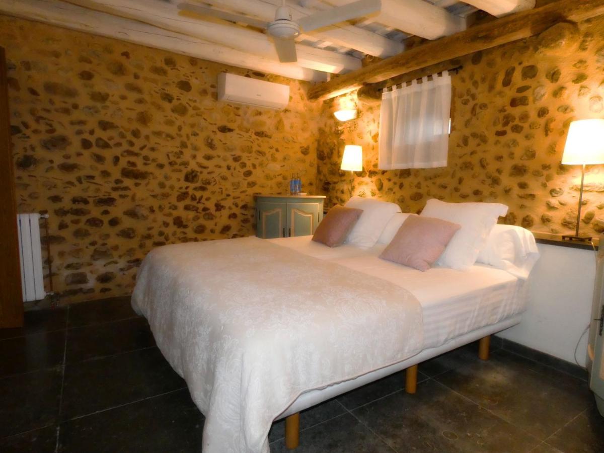 Cama o camas de una habitación en Casa Anamaria Hotel