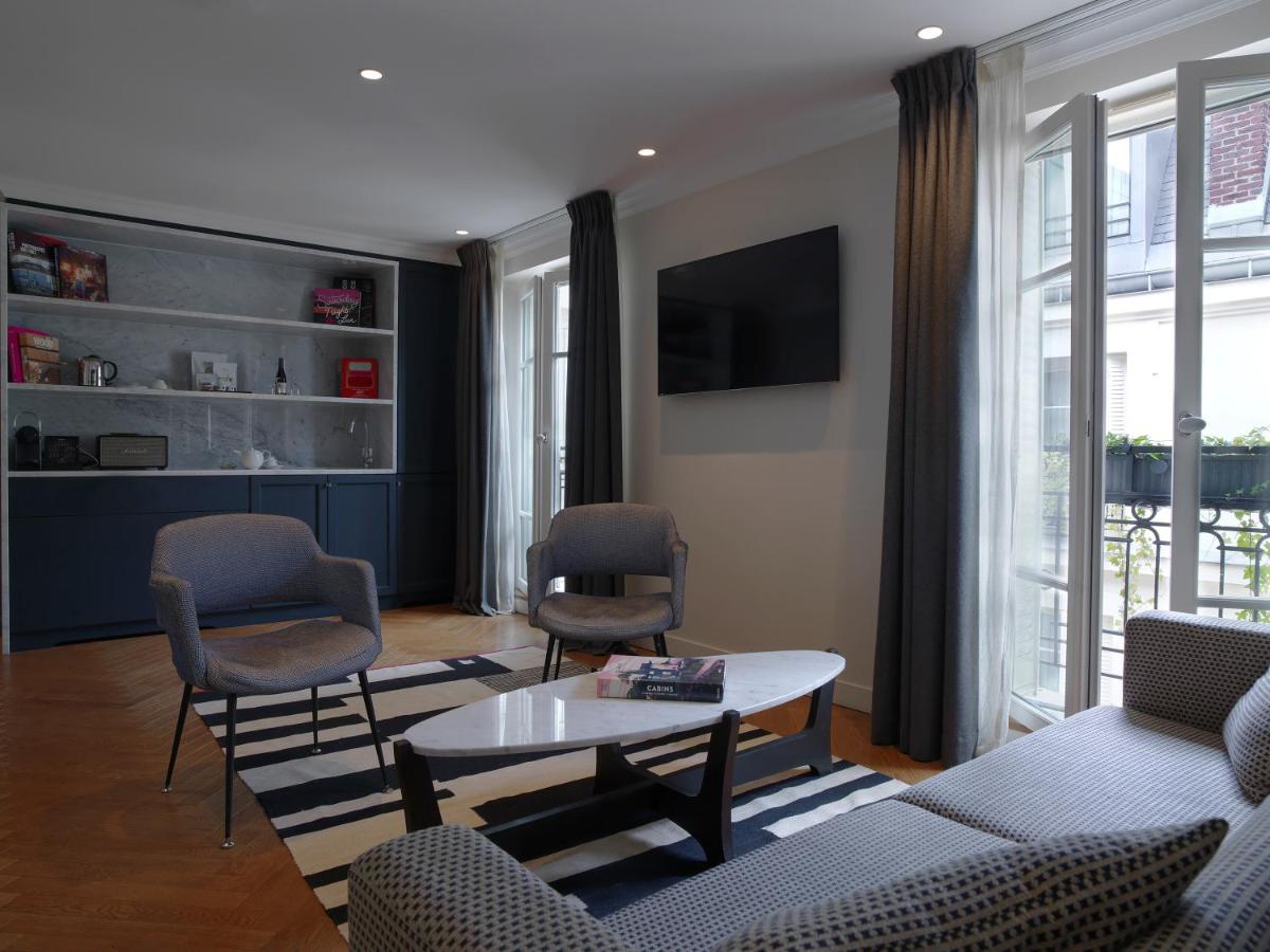 Télévision ou salle de divertissement dans l'établissement Hotel Bachaumont