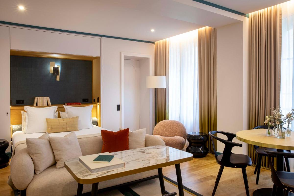 Coin salon dans l'établissement Hôtel Bel Ami