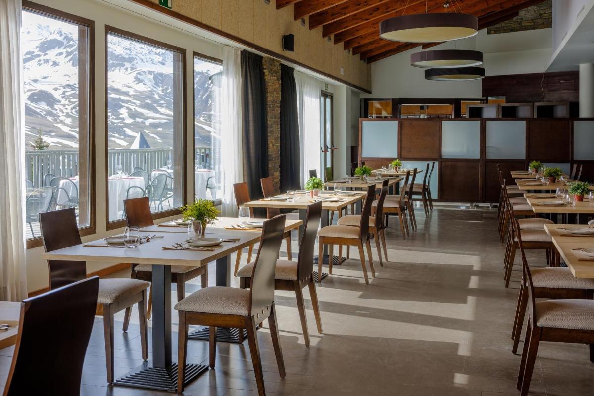 Un restaurante o sitio para comer en Snö Aragon Hills