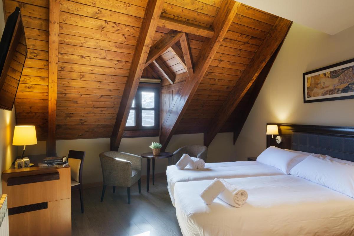 Cama o camas de una habitación en Snö Aragon Hills