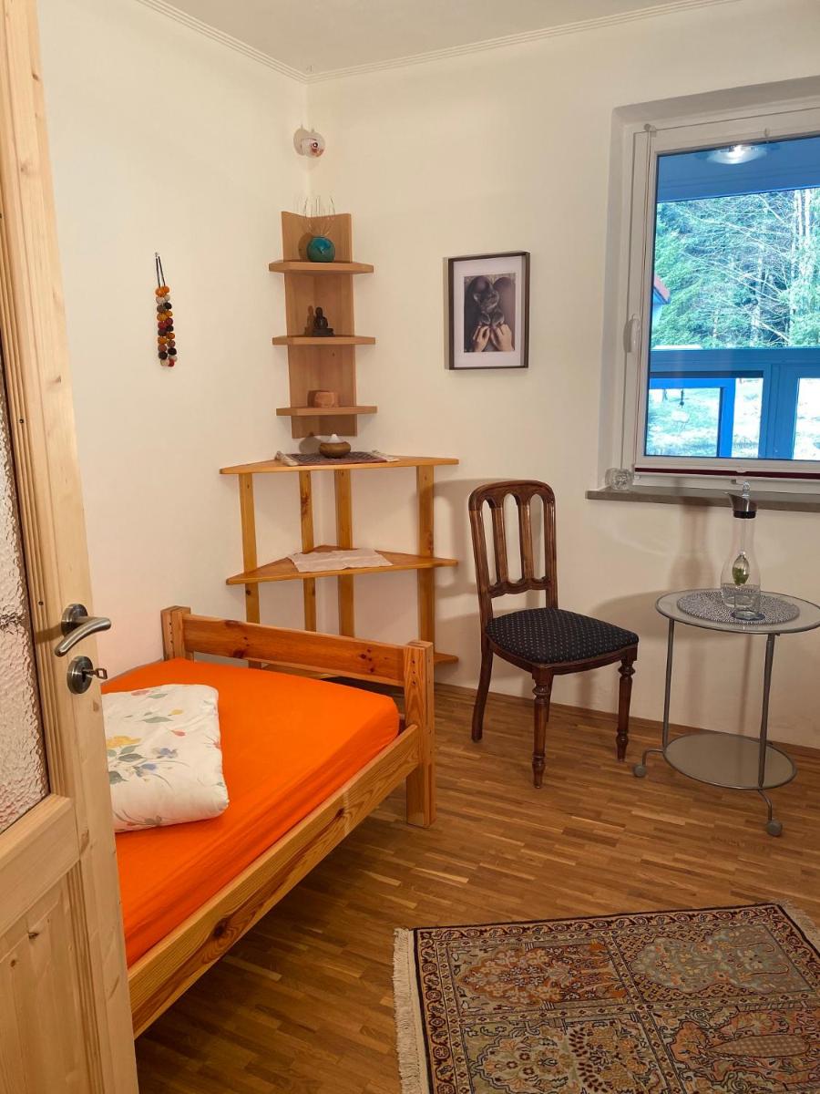 Ein Bett oder Betten in einem Zimmer der Unterkunft Haus am Waldpark