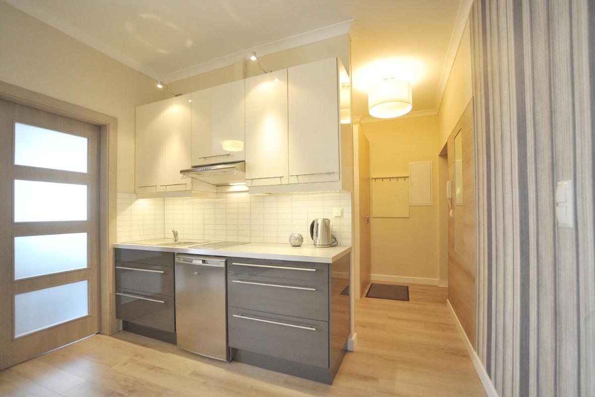 Grand-Tourist Center Point Apartments - Housity