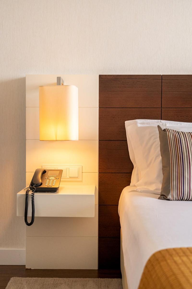 Uma cama ou camas num quarto em Monchique Resort & Spa