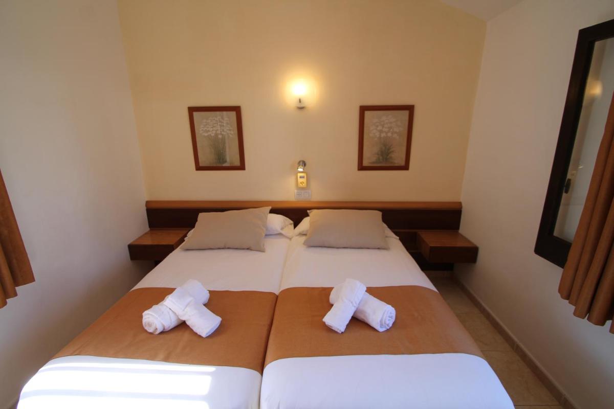 Cama o camas de una habitación en Apartaments Talayot