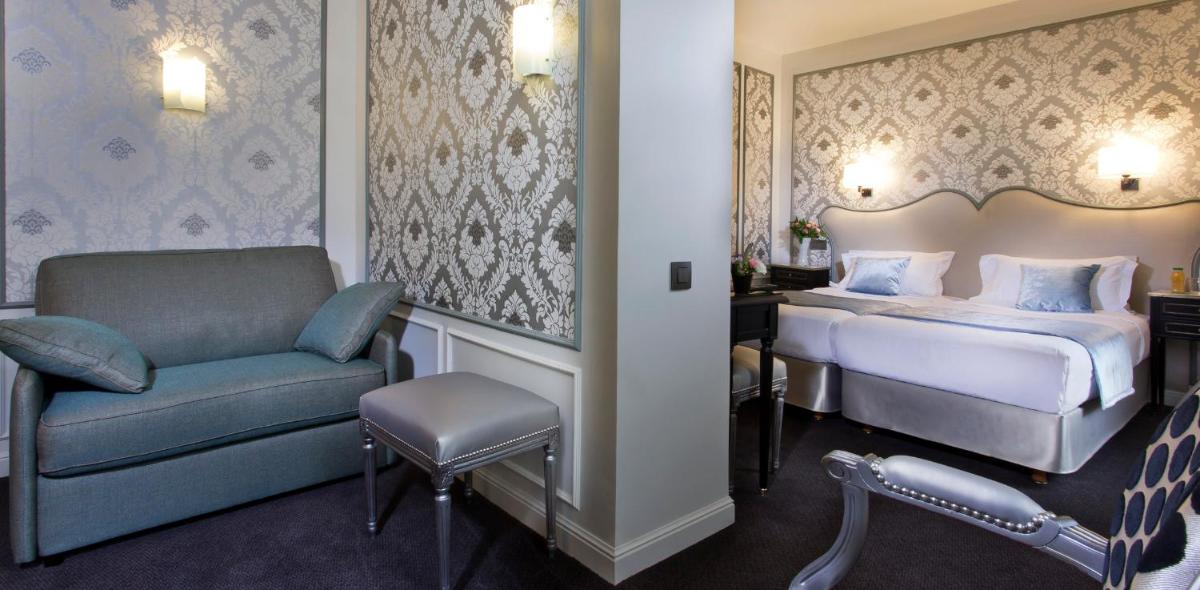 Un ou plusieurs lits dans un hébergement de l'établissement Hôtel Saint-Pétersbourg Opéra & Spa
