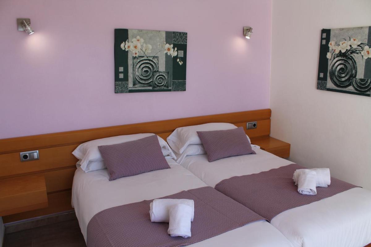 Cama o camas de una habitación en Apartaments Talayot