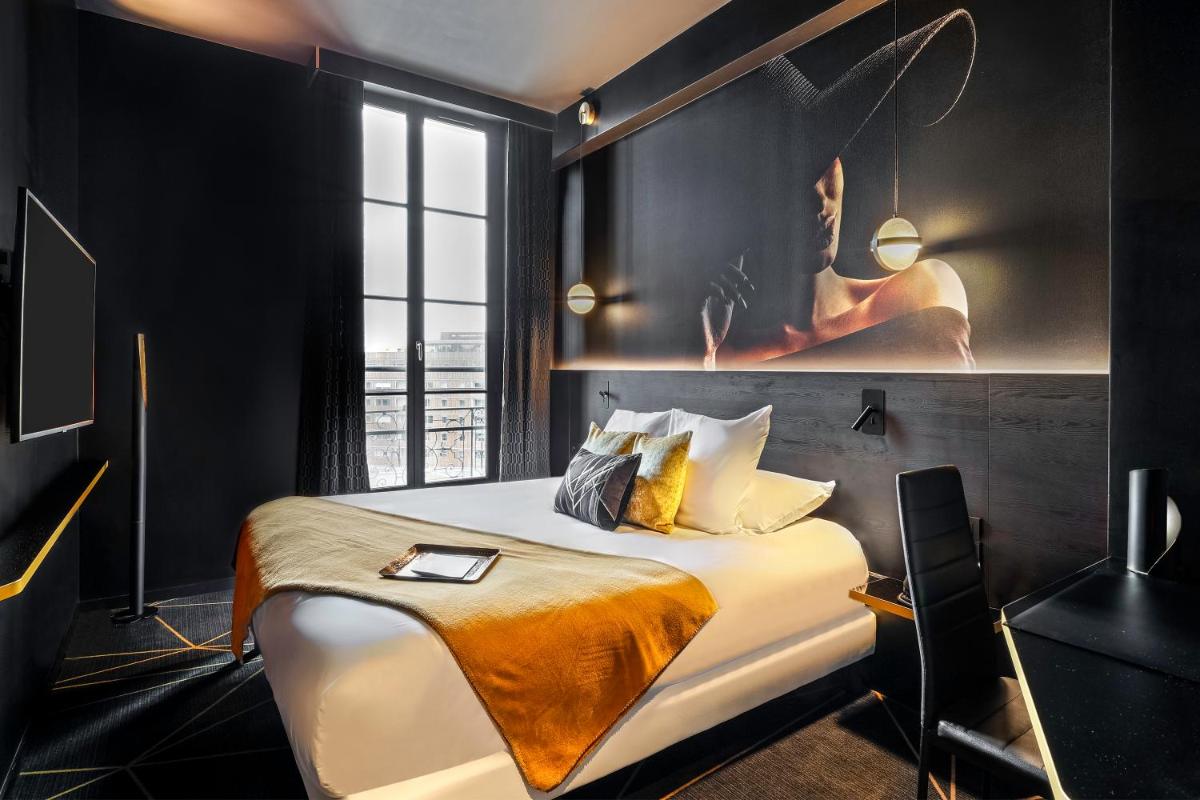 Un ou plusieurs lits dans un hébergement de l'établissement Hotel Leprince, Best Western Premier Collection