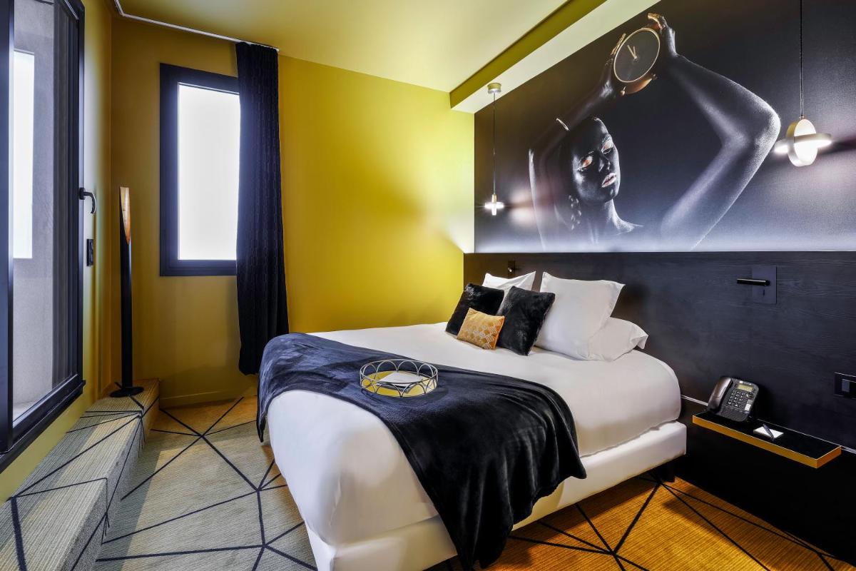Un ou plusieurs lits dans un hébergement de l'établissement Hotel Leprince, Best Western Premier Collection