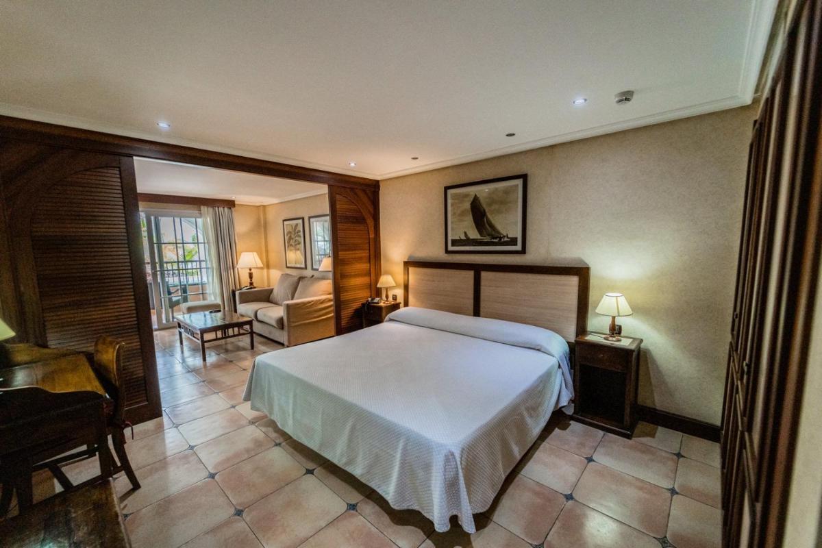 Cama o camas de una habitación en Paradise Park Fun Lifestyle Hotel
