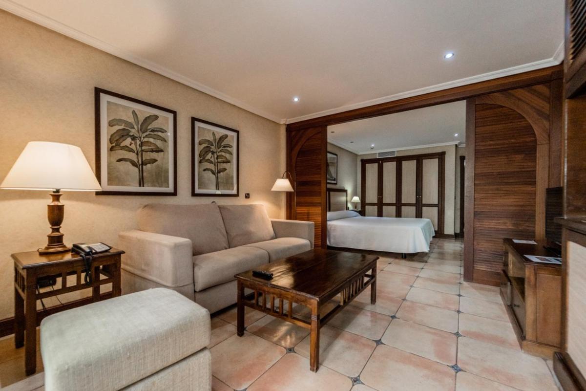 Cama o camas de una habitación en Paradise Park Fun Lifestyle Hotel