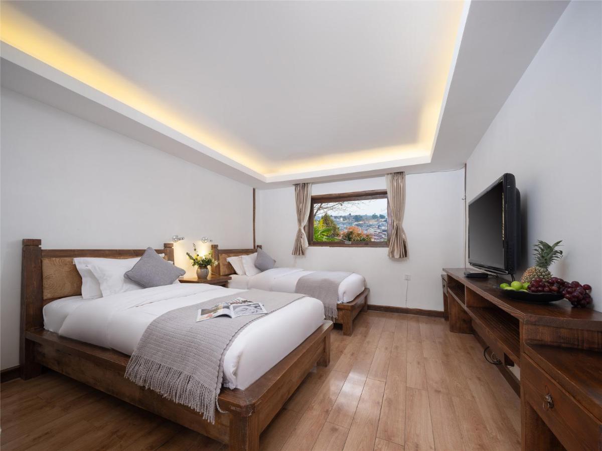 Lijiang Merry Inn - Housity
