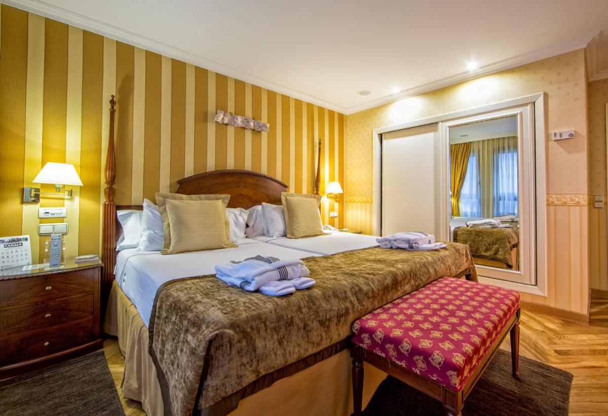 Cama o camas de una habitación en Eurostars Araguaney