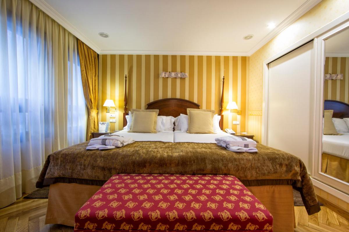 Cama o camas de una habitación en Eurostars Araguaney