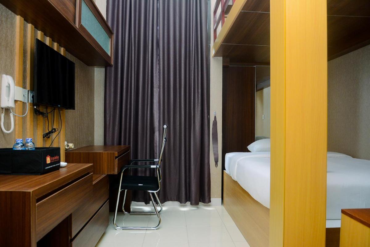 Simply and Cozy Studio at Dave Apartment By Travelio - Housity