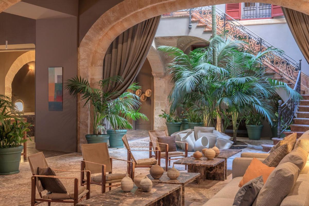 Zona de estar de Hotel Can Cera