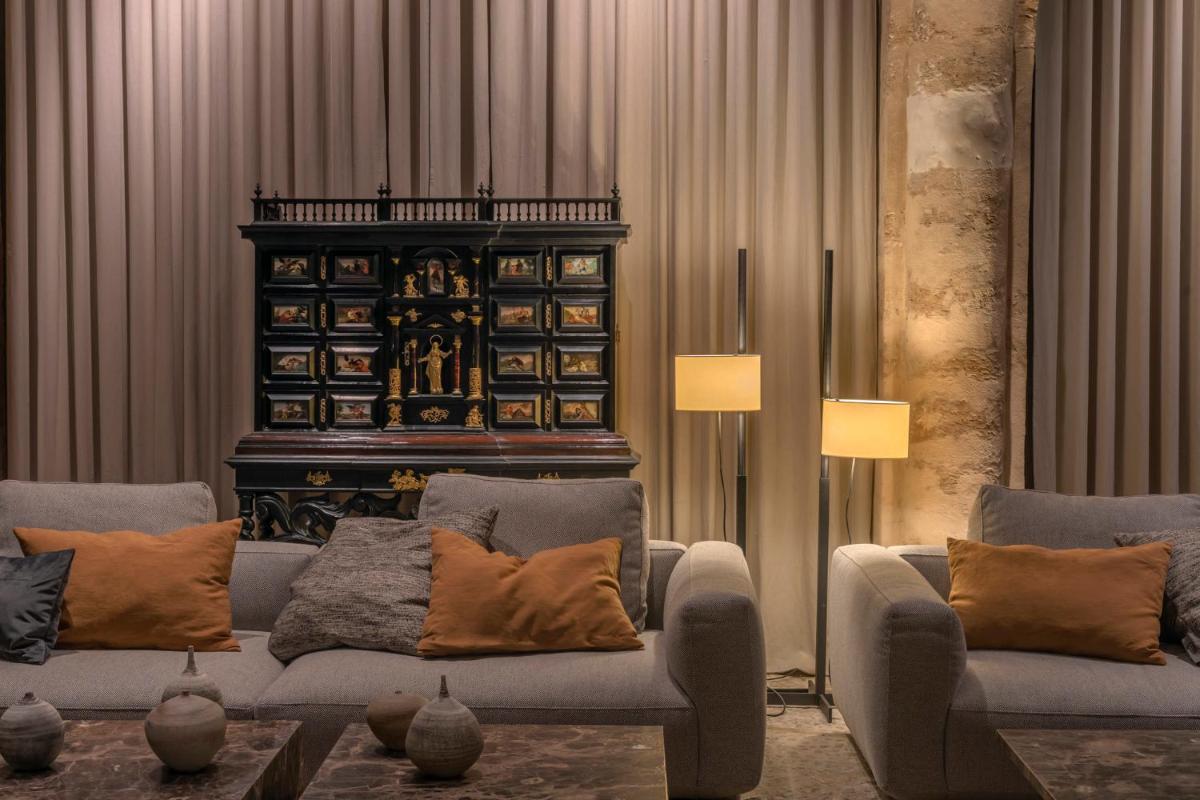 Zona de estar de Hotel Can Cera