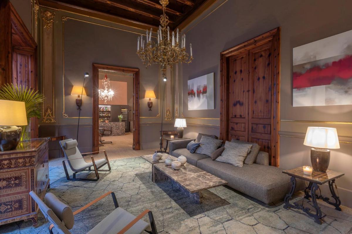 Zona de estar de Hotel Can Cera