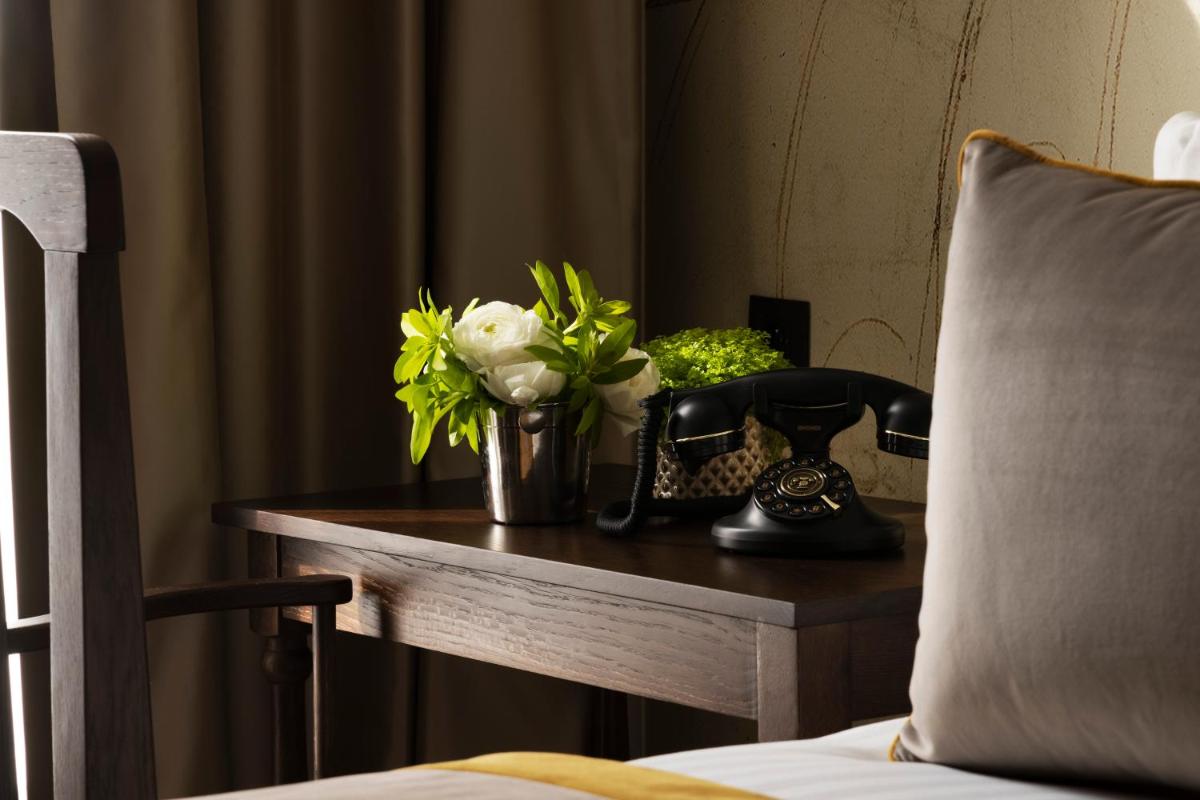 Coin salon dans l'établissement Hôtel & Spa Vinci Due