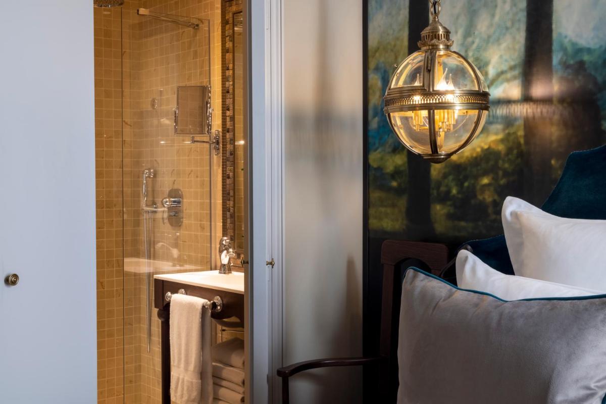 Salle de bains dans l'établissement Hôtel & Spa Vinci Due