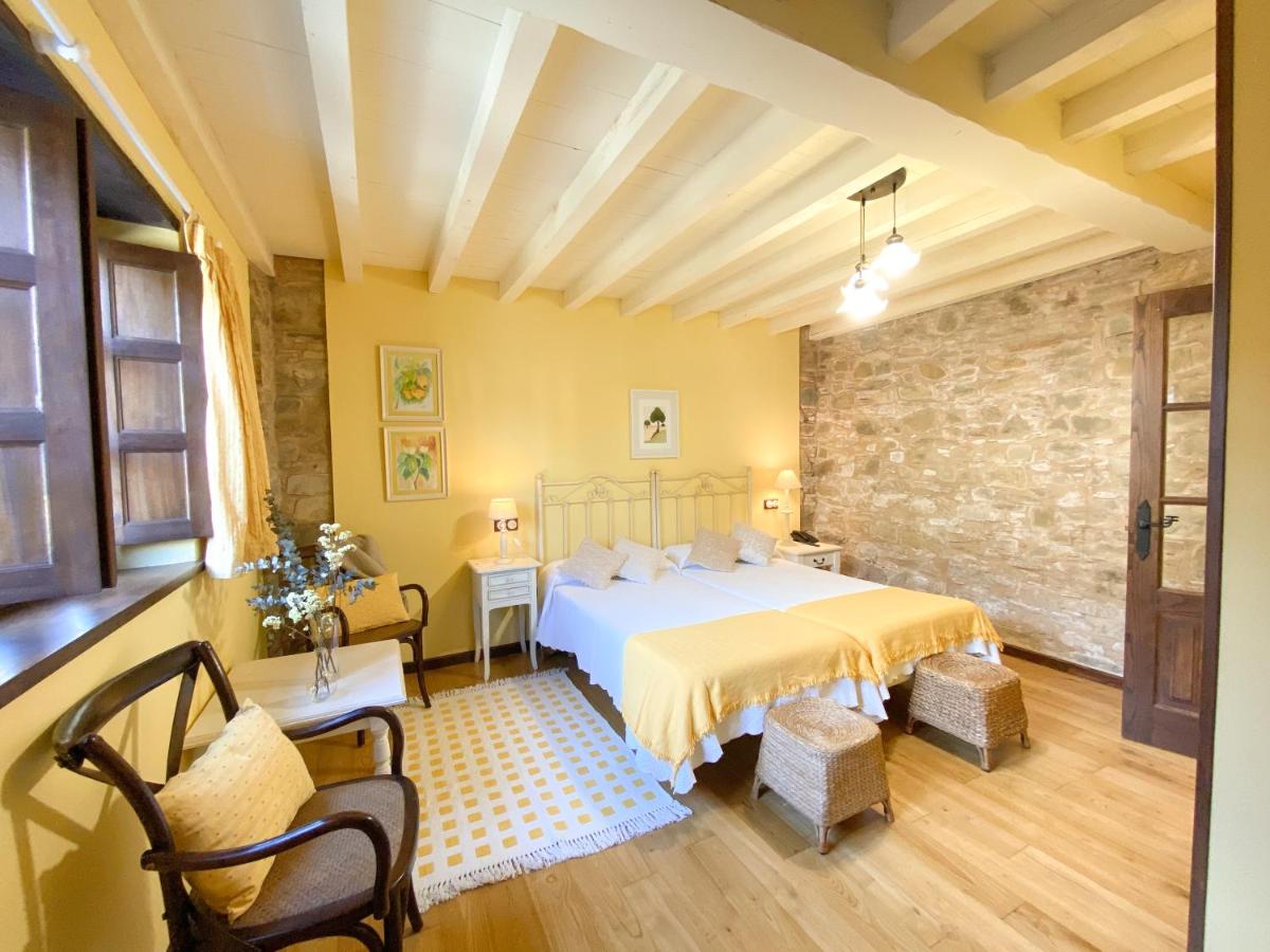 Cama o camas de una habitación en Hotel Casa Cachón
