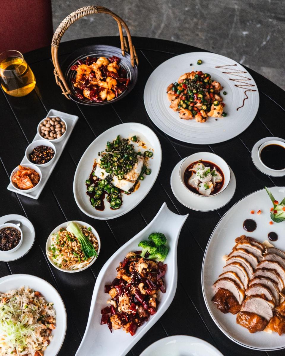 a table full of plates of food on a table at Shangri-La Bengaluru in Bengaluru a table full of plates of food on a table at Shangri-La Bengaluru in Bengaluru