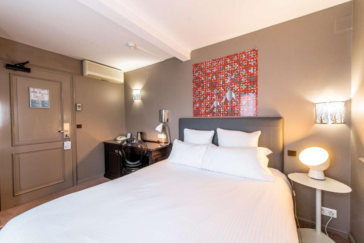 Un ou plusieurs lits dans un hébergement de l'établissement Best Western Plus Au cheval Blanc à Mulhouse