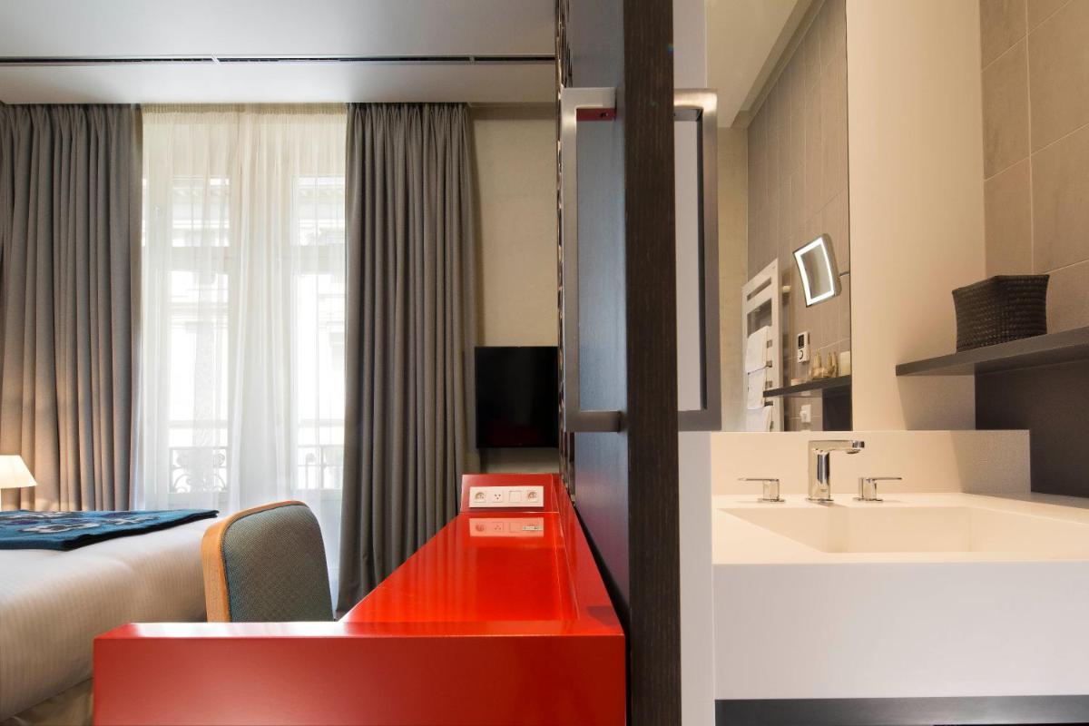 Un ou plusieurs lits dans un hébergement de l'établissement Hotel D - Strasbourg