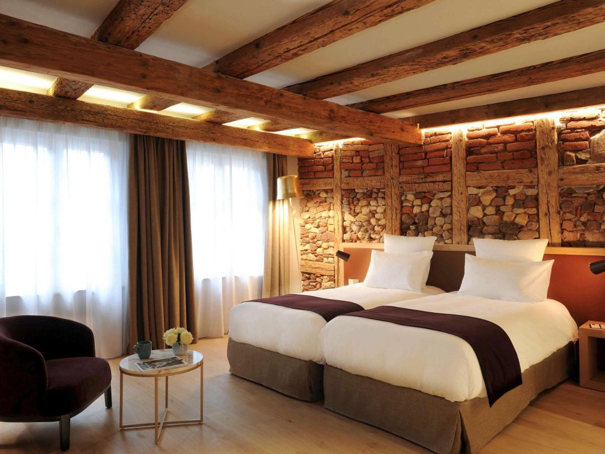 Un ou plusieurs lits dans un hébergement de l'établissement 5 Terres Hotel & Spa - MGallery Collection