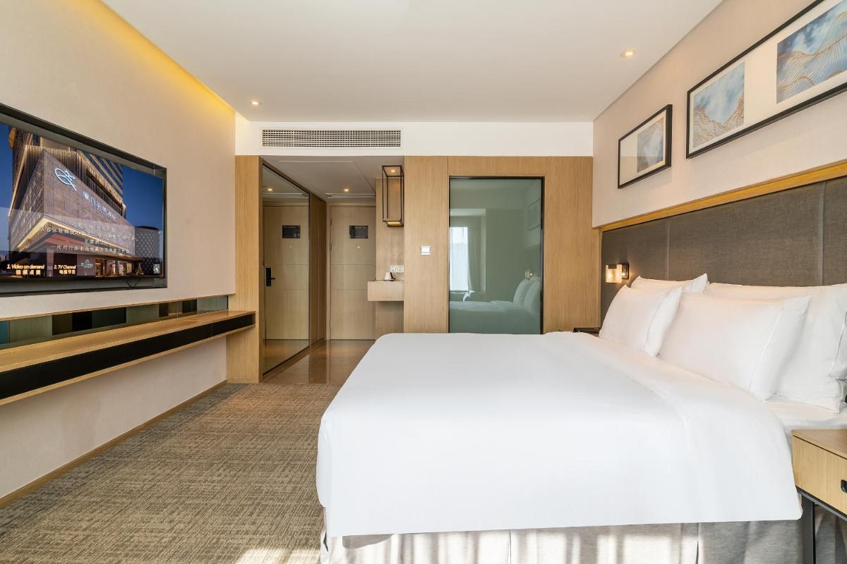 Zenith Hotel-Near Train Station & The Mixc - Housity