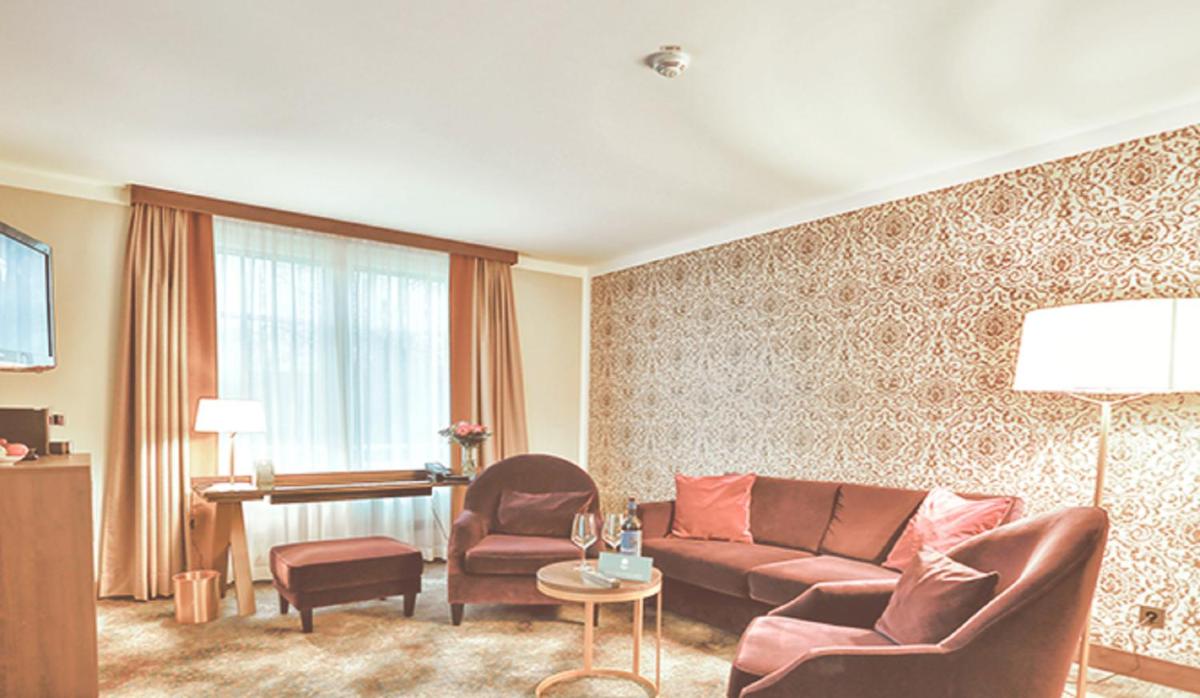 Ein Sitzbereich in der Unterkunft SCHLOSS Fleesensee