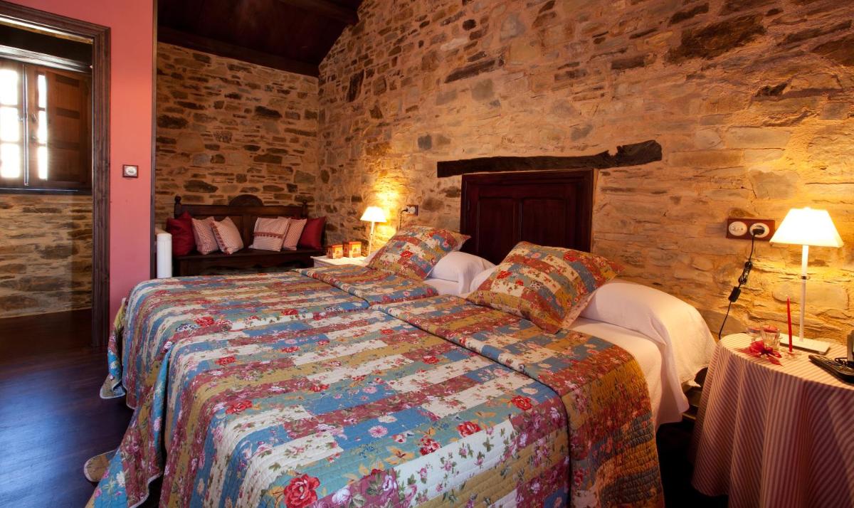 Cama o camas de una habitación en Hotel Casa Cachón