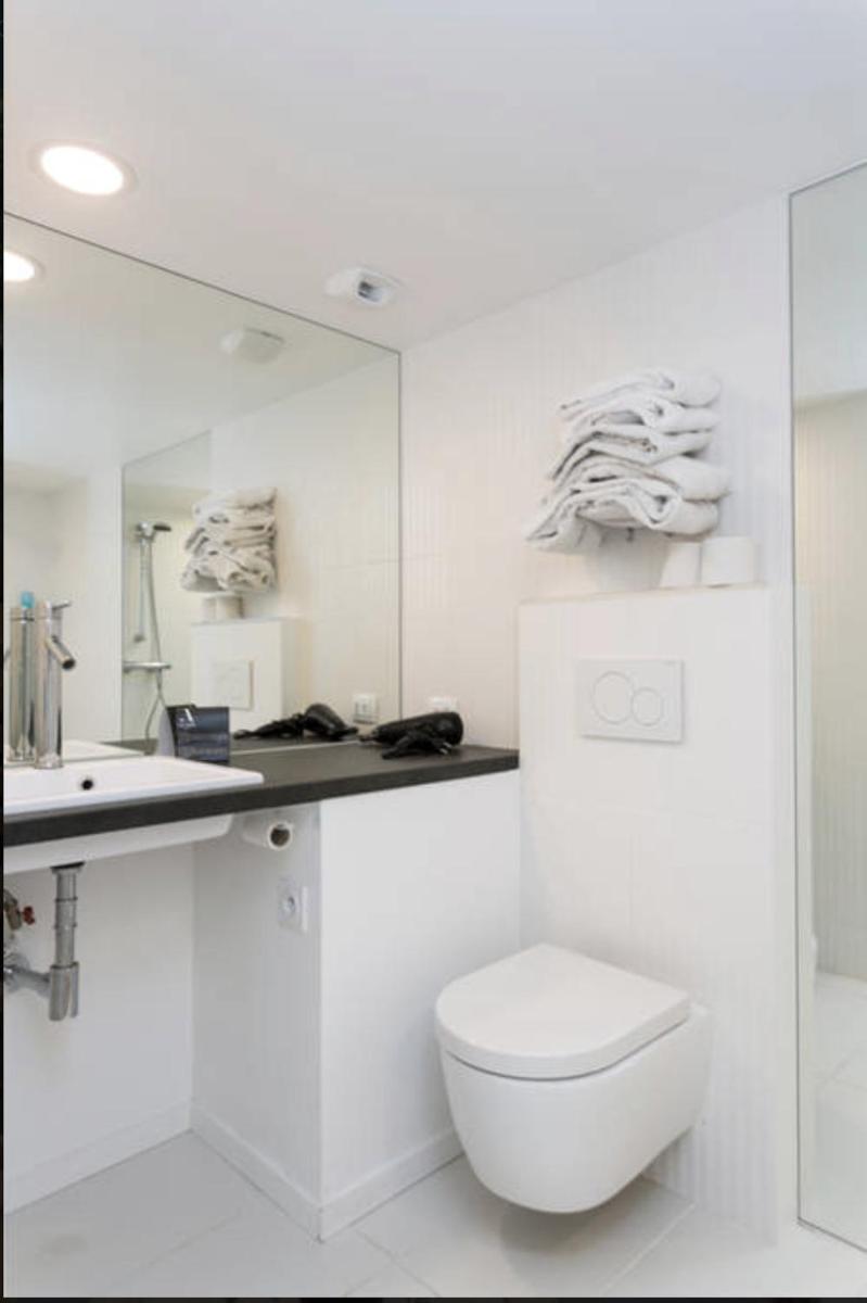 Salle de bains dans l'établissement Atypik Hotel