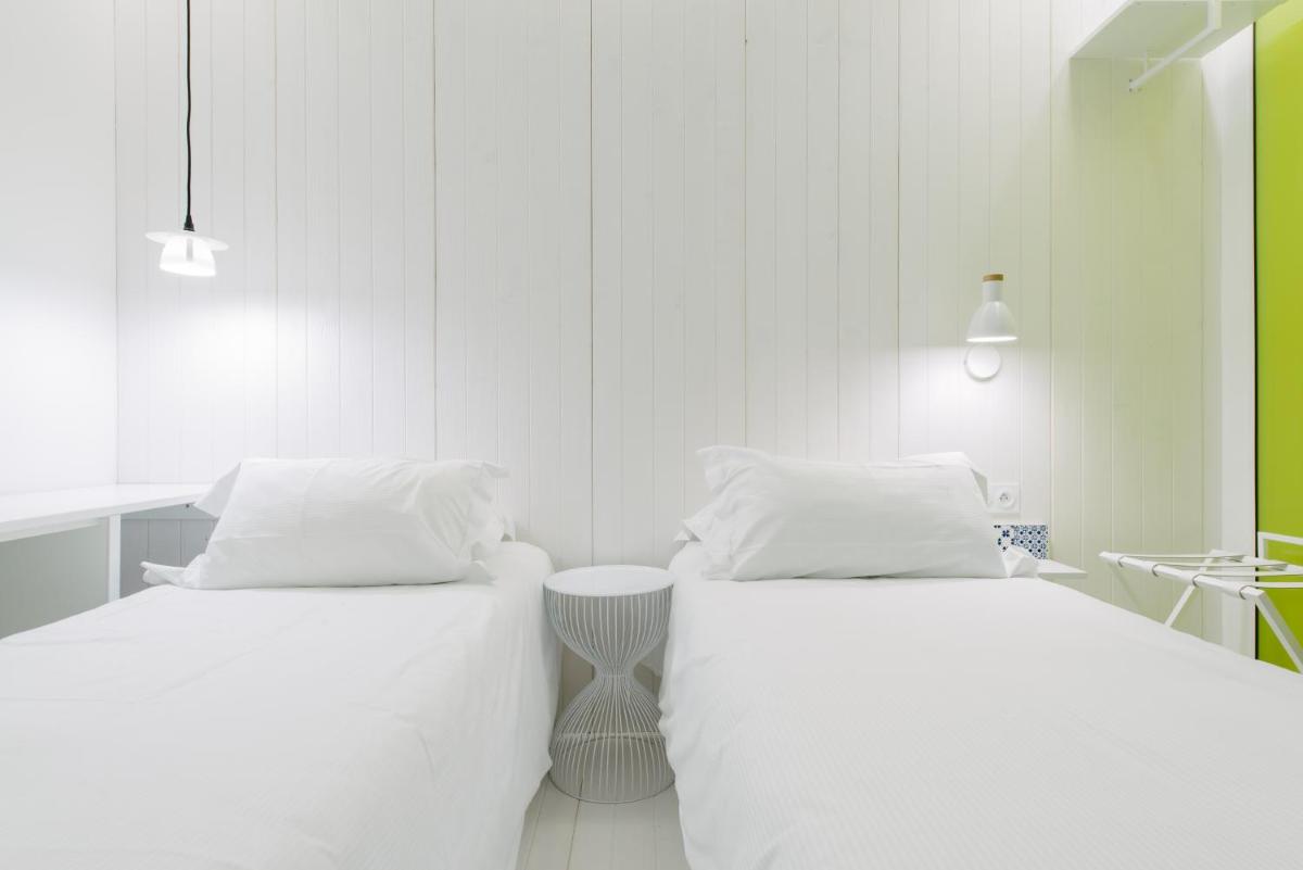 Un ou plusieurs lits dans un hébergement de l'établissement Atypik Hotel