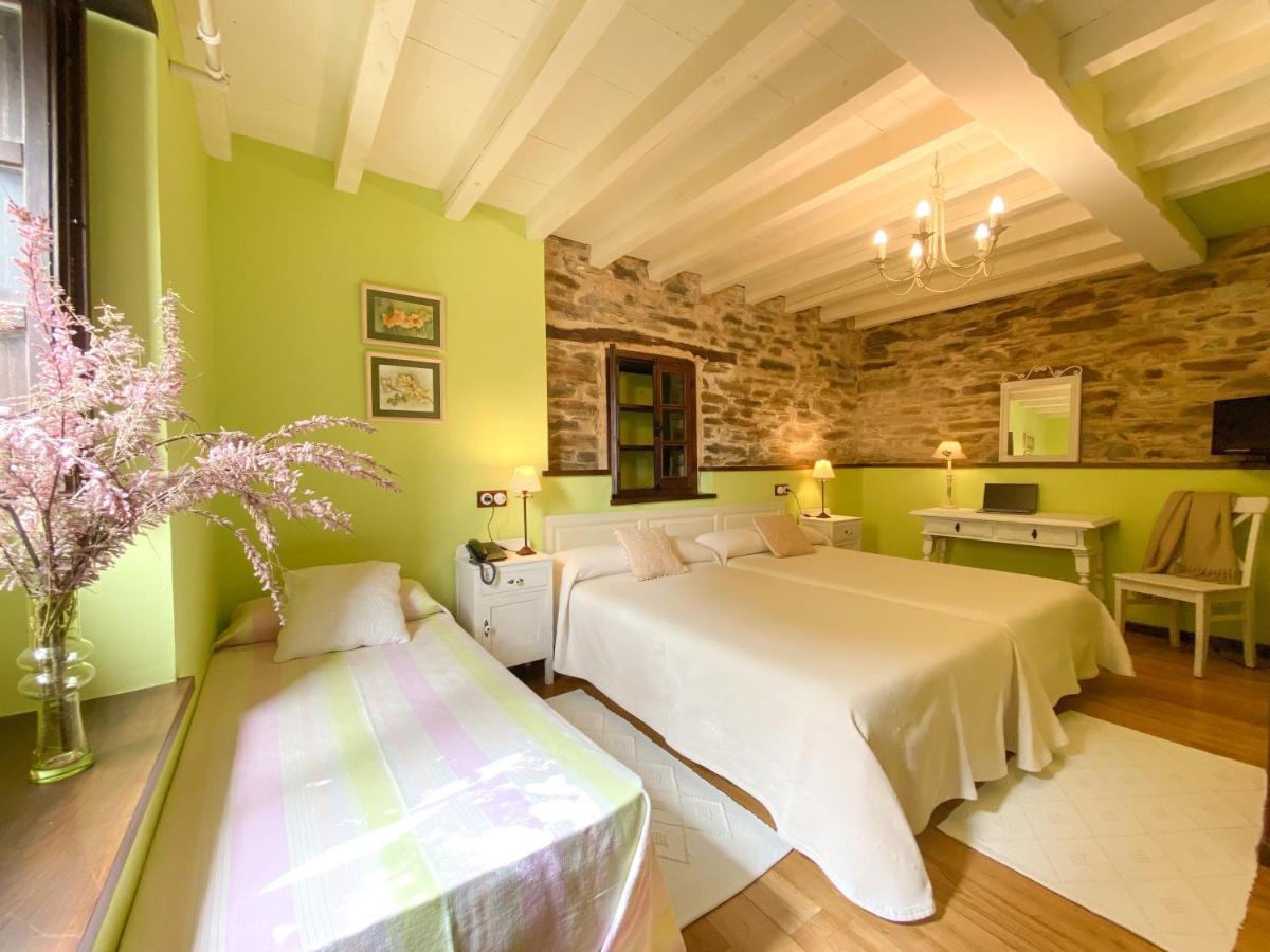 Cama o camas de una habitación en Hotel Casa Cachón