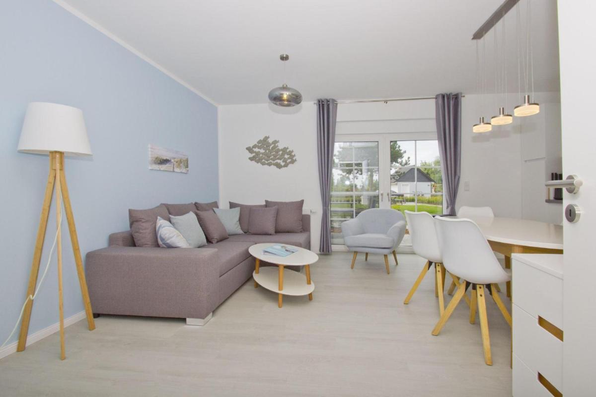 moderne Ferienwohnung mit eigener Terrasse - Haus Inselwind FeWo MEERglück - Housity