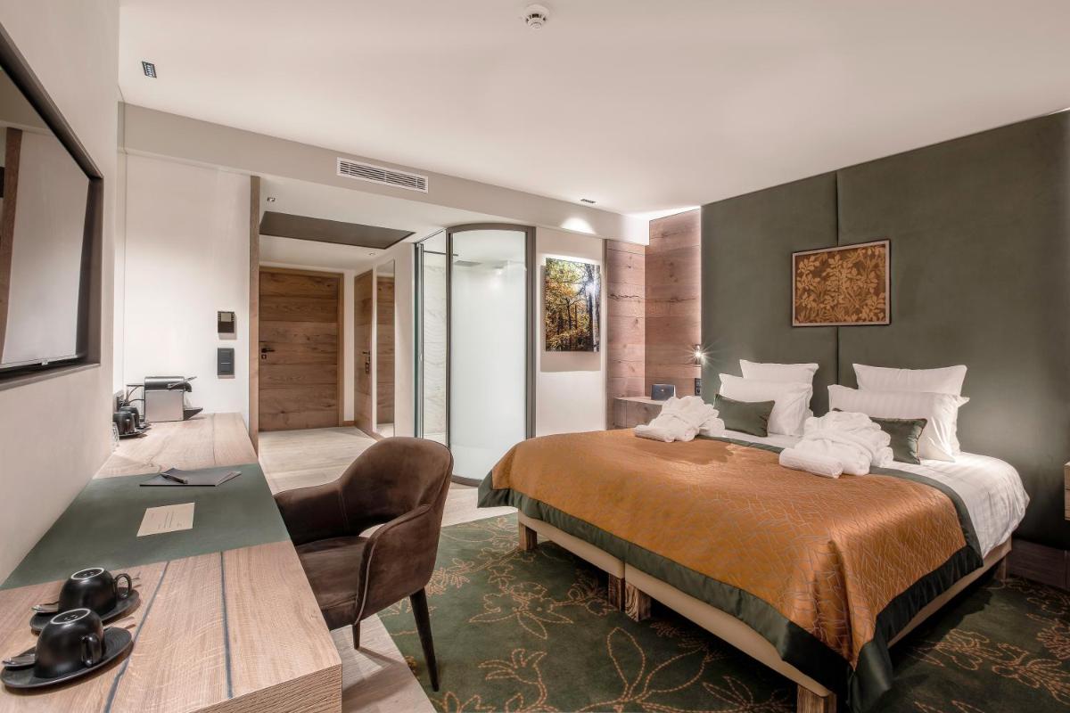 Un ou plusieurs lits dans un hébergement de l'établissement Rivage Hôtel & Spa Annecy