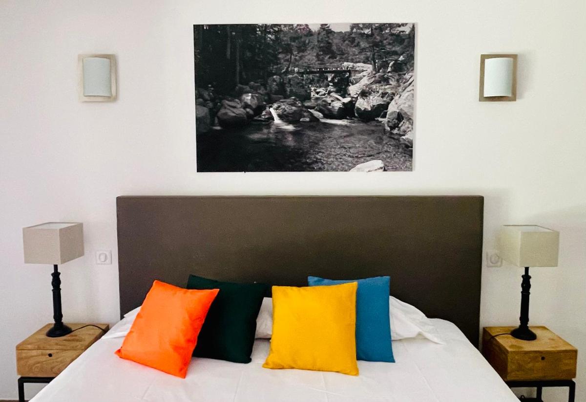 Un ou plusieurs lits dans un hébergement de l'établissement Hôtel Casa Rossa & Spa