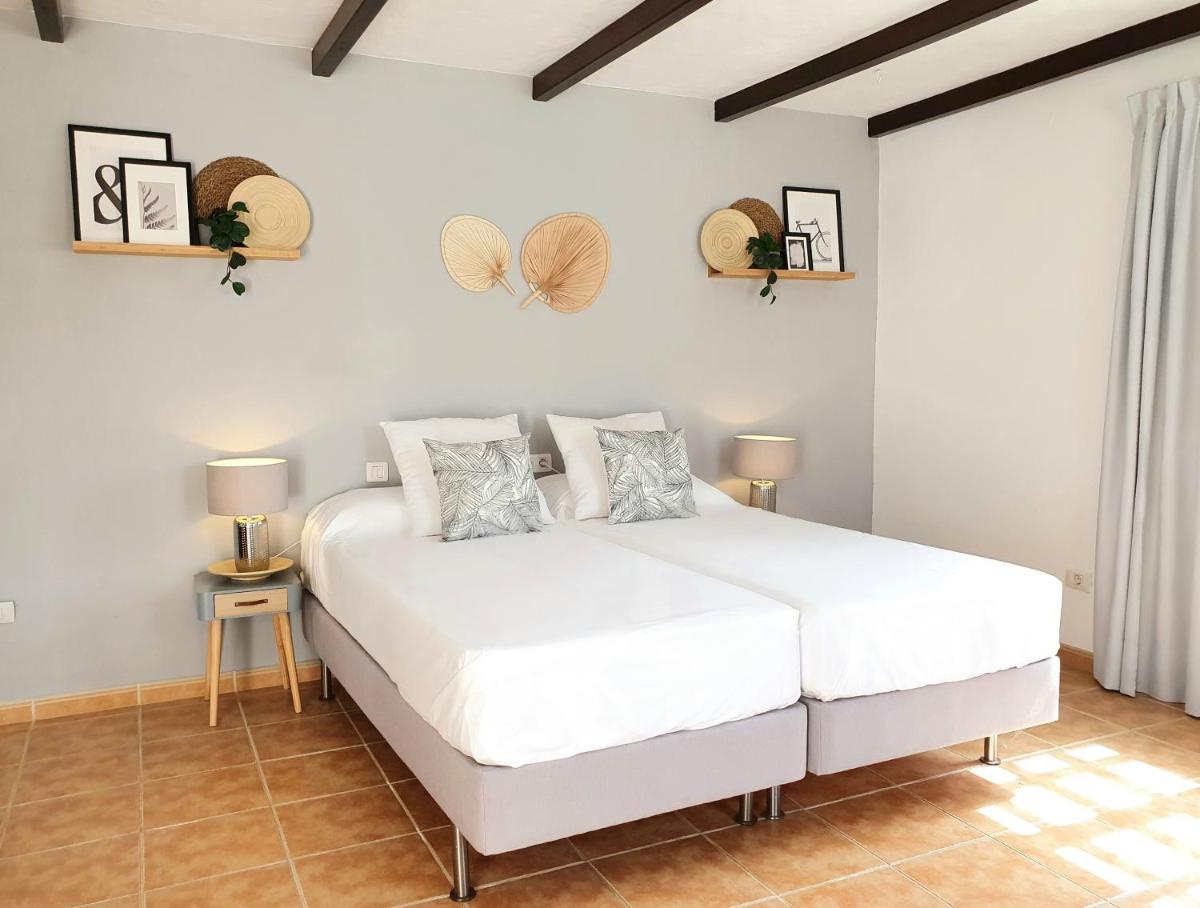 Cama o camas de una habitación en Casas Heddy, Well-being Resort