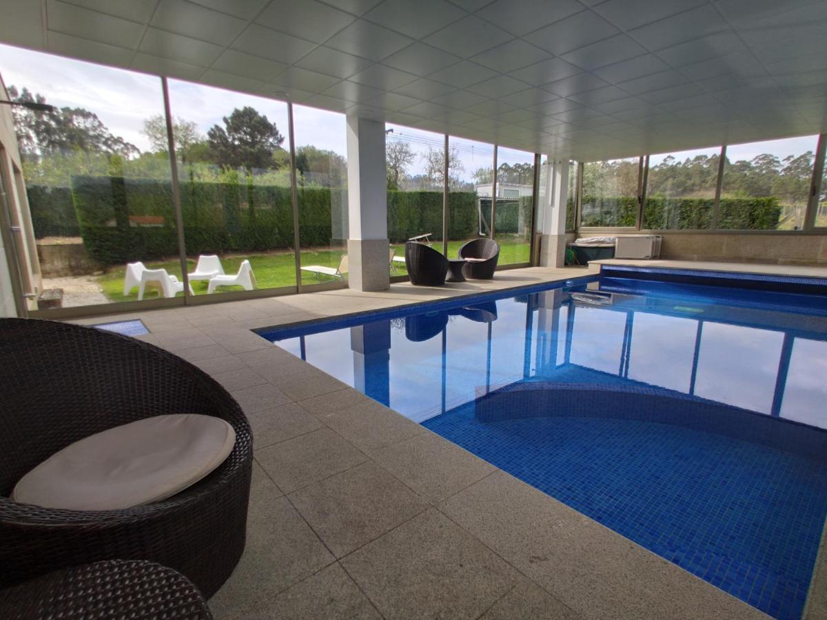 Sanxenxo Casa Rial 47 con PISCINA CLIMATIZADA - Housity