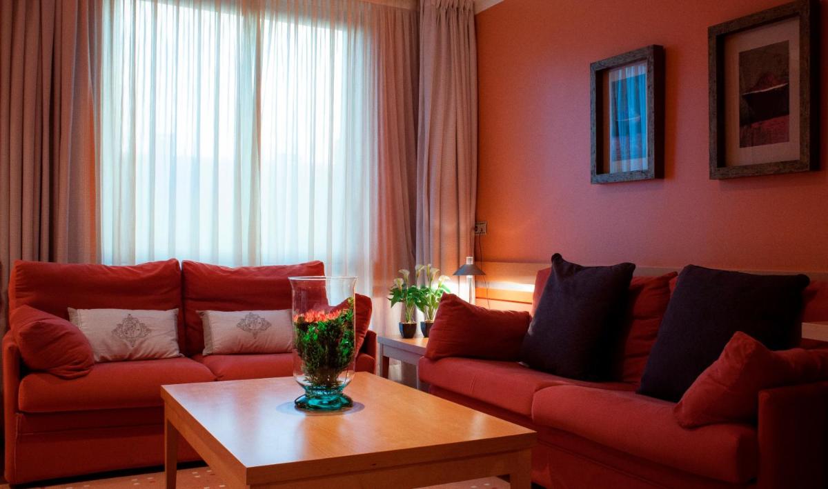 Zona de estar de Hotel Torresport