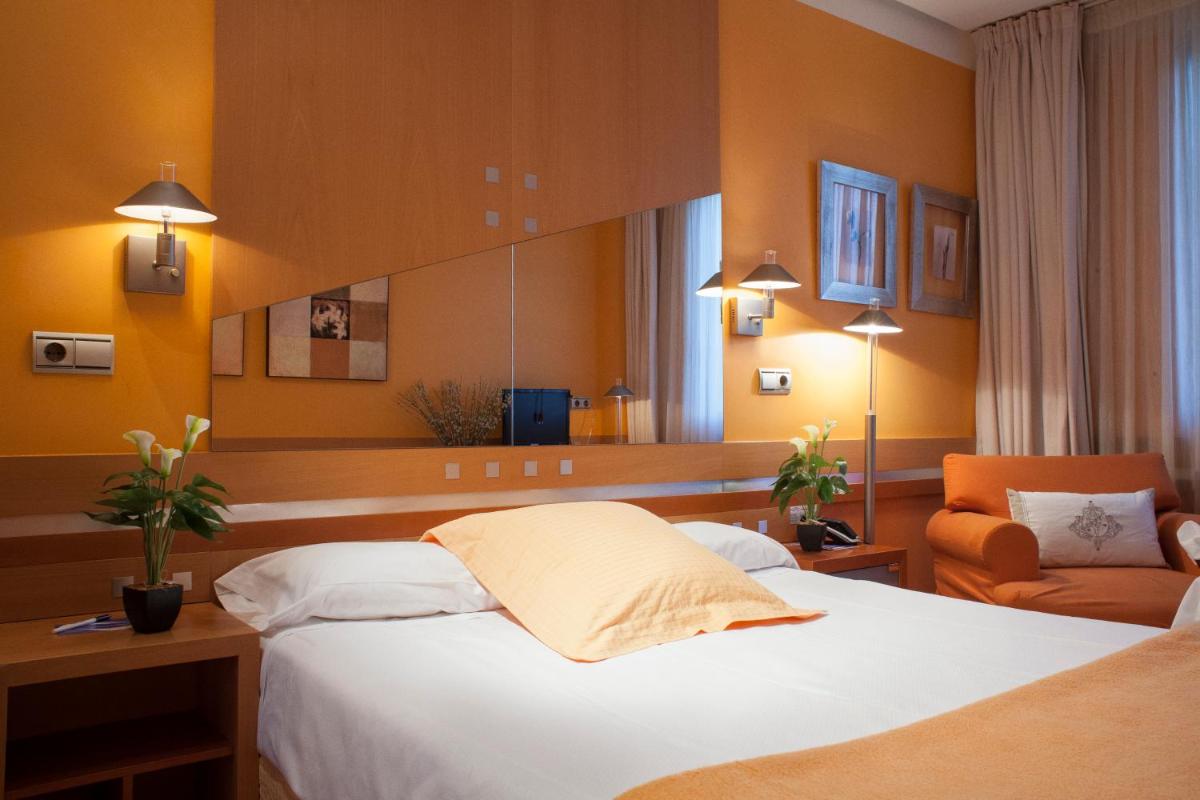 Cama o camas de una habitación en Hotel Torresport