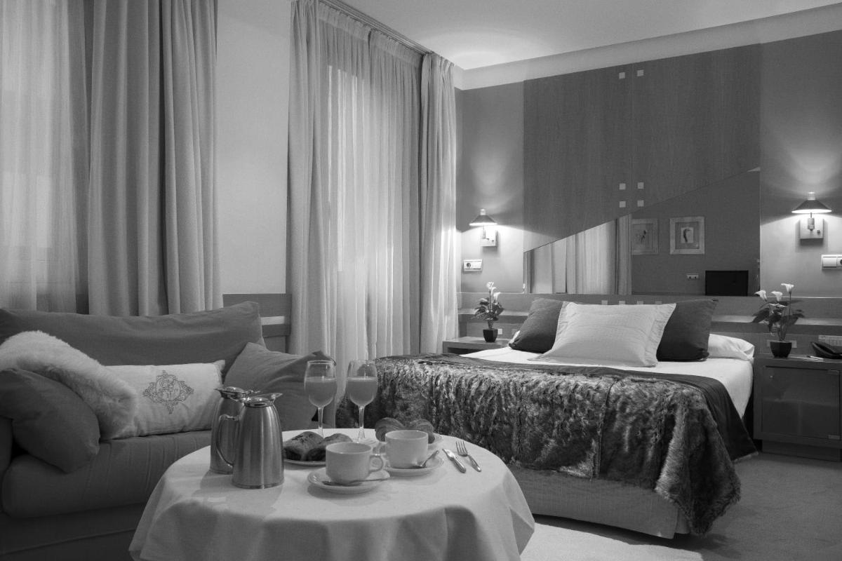 Cama o camas de una habitación en Hotel Torresport