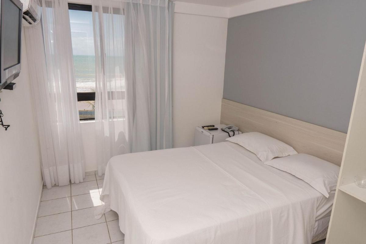 Suíte para casal em Areia Preta Natal por Carpediem - Housity