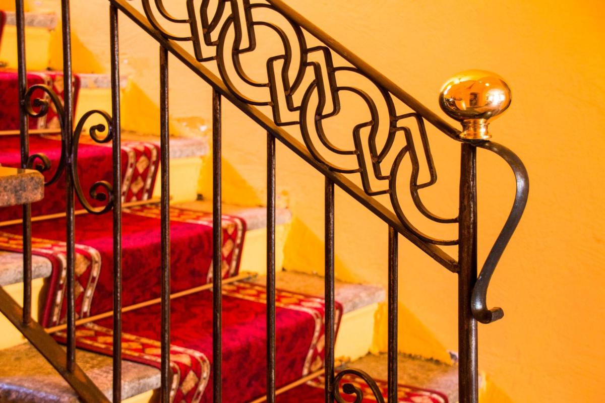 Un ou plusieurs lits dans un hébergement de l'établissement Hôtel U Palazzu & Spa
