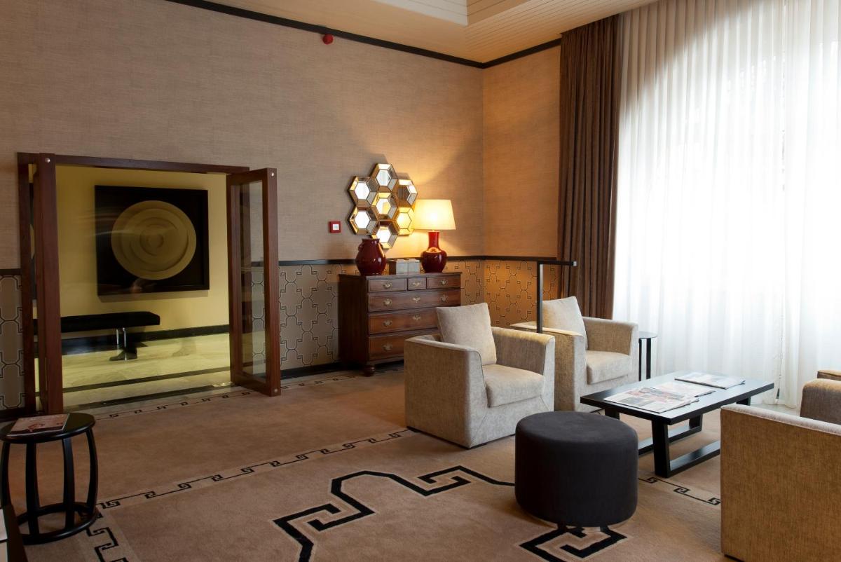 Uma área de estar em Grande Hotel De Luso