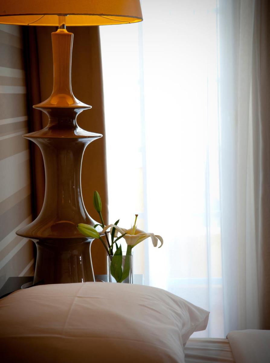 Uma cama ou camas num quarto em Grande Hotel De Luso