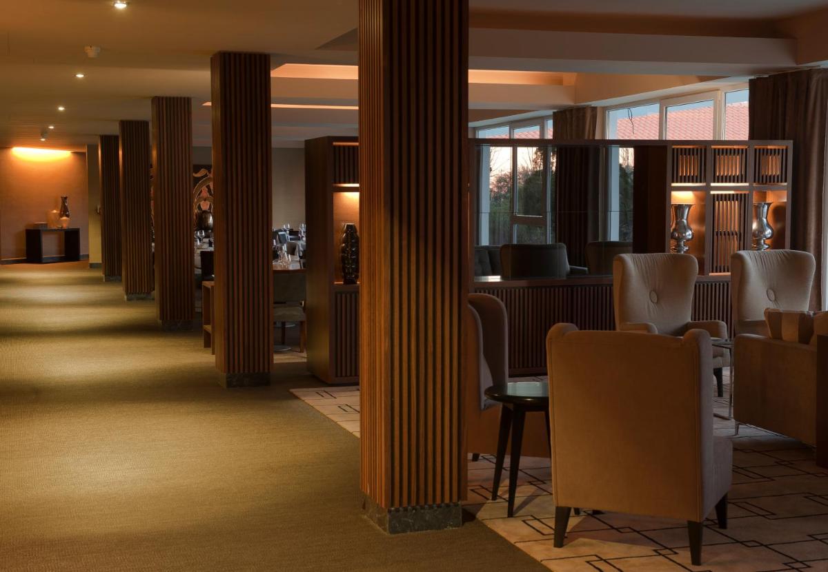 Uma área de estar em Grande Hotel De Luso