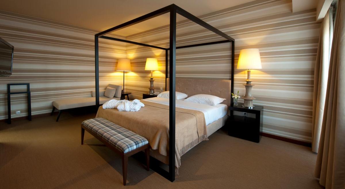 Uma cama ou camas num quarto em Grande Hotel De Luso